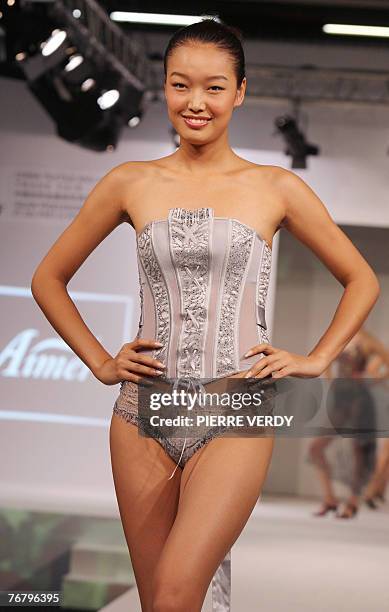 Model presents a creation of Chinese company Aimer during the China Textile And Apparel Trade Fair , the 17 September 2007 in Le Bourget, northern...