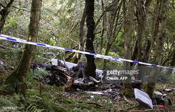 The scene after the helicopter in which former rally world champion Colin McRae was flying crashed, near his home in Lanark, in Scotland, 17...