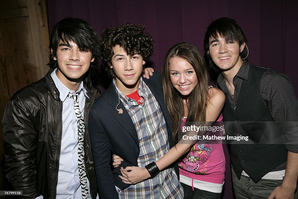 Miley Cyrus and The Honas Brothers Visit Six Flags Magic Mountain