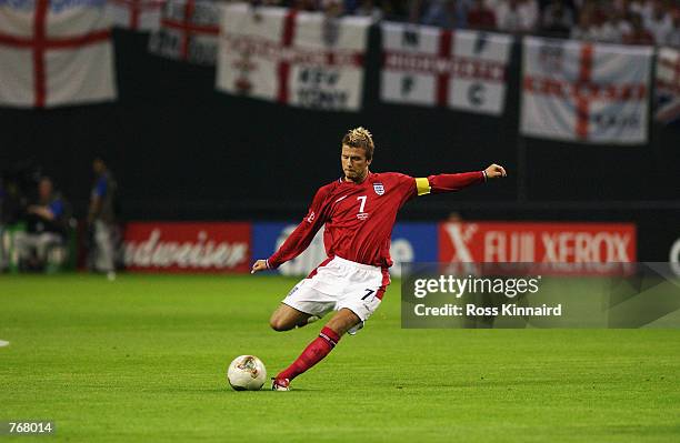 David Beckham of England in action during the Group F match against Argentina of the World Cup Group Stage played at the Sapporo Dome in Sapporo,...