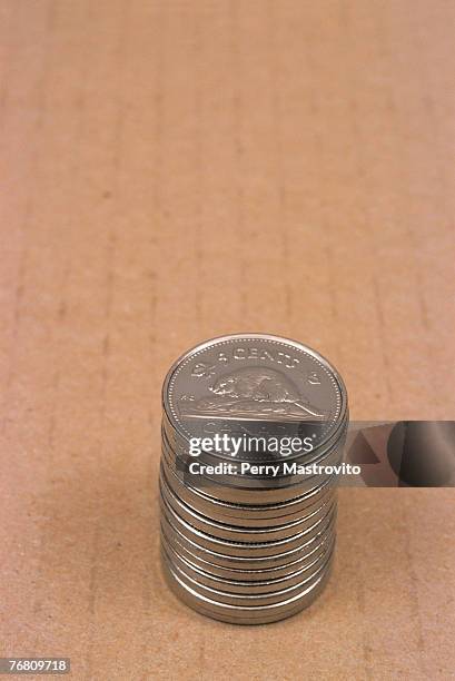 stack of canadian five cent coins - five cent coin stockfoto's en -beelden