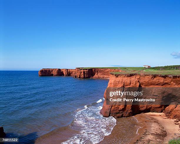 cliffs at la belle-anse - islas de la magdalena fotografías e imágenes de stock