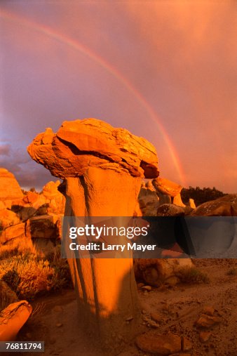 Rock formations and rainbow Rock formations and rainbow