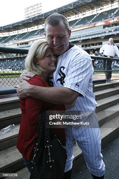 September 16: Designated hitter Jim Thome of the Chicago White Sox celebrates with his wife, Andrea Thome, after hitting his 500th career homerun...