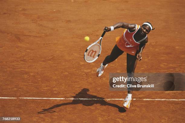Serena Williams of the United States serves to Ai Sugiyama of Japan during their Women's Singles fourth round match of the French Open on 1 June 2003...