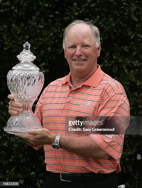 Tom Jenkins holds the trophy following the cancellation the final round of the SAS Championship held at Prestonwood CC in Cary, North Carolina on...