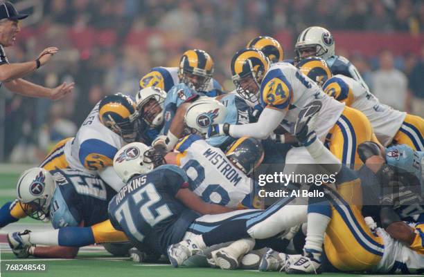 Lorenzo Neal, Full Back for the Tennessee Titans carries the ball over the line for a touchdown against the St. Louis Rams during the National...