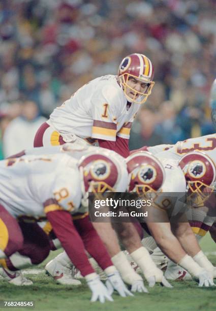 Mark Rypien, Quarterback for the Washington Redskins calls the play on the line of scrimmage during the National Football Conference Championship...