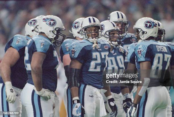 Eddie George, Running Back for theTennessee Titans looks out from his team mates during their National Football League Super Bowl XXXIV game against...