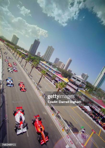 Alex Zanardi of Italy driving the Target Chip Ganassi Racing Reynard 97I Honda leads away from Paul Tracy driving the Marlboro Team PenskePenske...