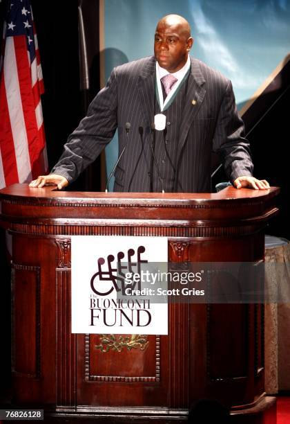 Earvin "Magic" Johnson speaks at the 22nd Annual Great Sports Legends Dinner to benefit The Buoniconti Fund to Cure Paralysis at the Waldorf Astoria...