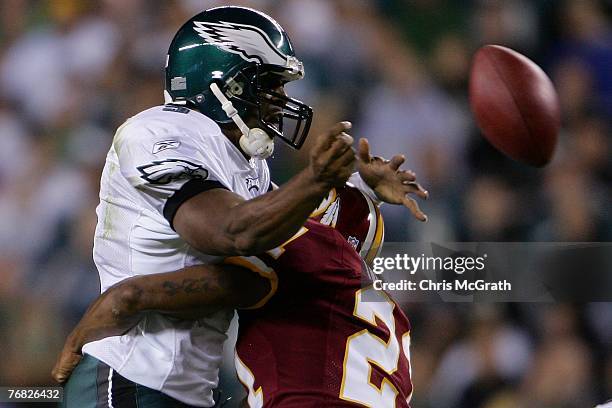 Quarterback Donovan McNabb of the Philadelphia Eagle is sacked by Sean Taylor of the Washington Redskins at Lincoln Financial Field on September 17,...