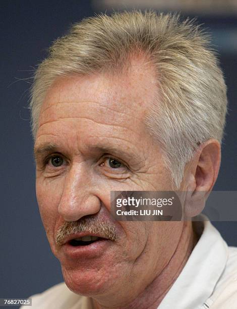 Australia's head coach Tom Sermanni answers a question at the pre-match press conference in Chengdu, in China's southwestern province of Sichuan, 18...