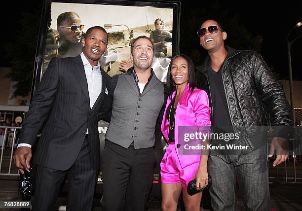 Actors Jamie Foxx, Jeremy Piven, Jada Pinkett Smith and Will Smith pose at the premiere of Universal Picture's "The Kingdom" at the Mann's Village...