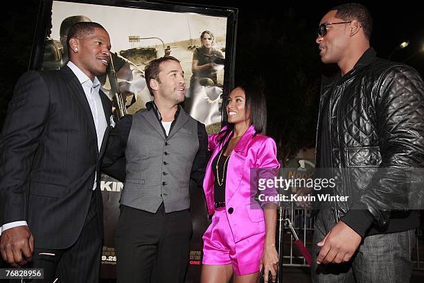 Actors Jamie Foxx, Jeremy Piven, Jada Pinkett Smith and Will Smith pose at the premiere of Universal Picture's "The Kingdom" at the Mann's Village...