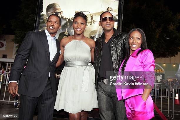 Actor Jamie Foxx, tennis pro Serena Williams, actors Jada Pinkett Smith and Will Smith pose at the premiere of Universal Picture's "The Kingdom" at...