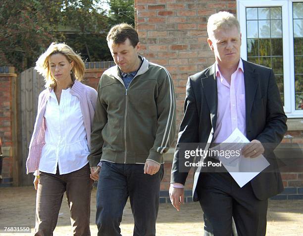 Spokesman Clarence Mitchell, a former BBC journalist, makes his way along with Kate and Gerry McCann to give a statement to the press, September 18,...