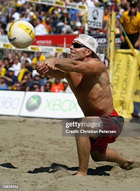 Casey Jennings passes the ball in the AVP San Francisco Best of the Beach Open final match against Jake Gibb and Sean Rosenthal at Pier 30/32 on...