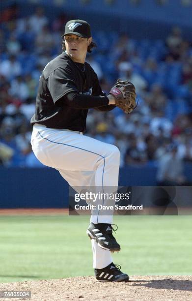 Scott Downs of the Toronto Blue Jays delivers the pitch against the Seattle Mariners on September 2, 2007 at the Rogers Centre in Toronto, Ontario,...