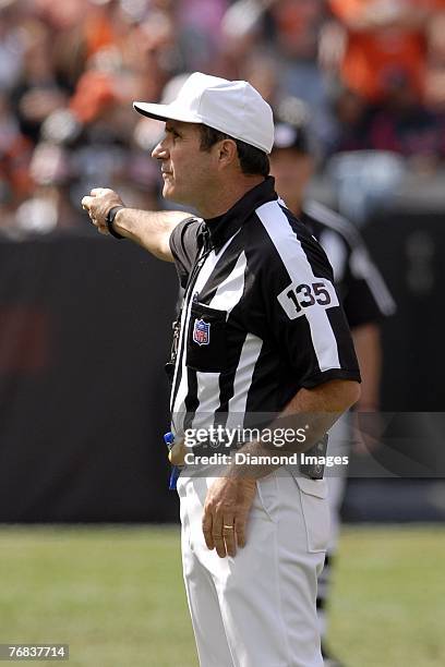 Referee Pete Morelli signals which team was penalized during the Cincinnati Bengals versus Cleveland Browns game on September 16, 2007 at Cleveland...