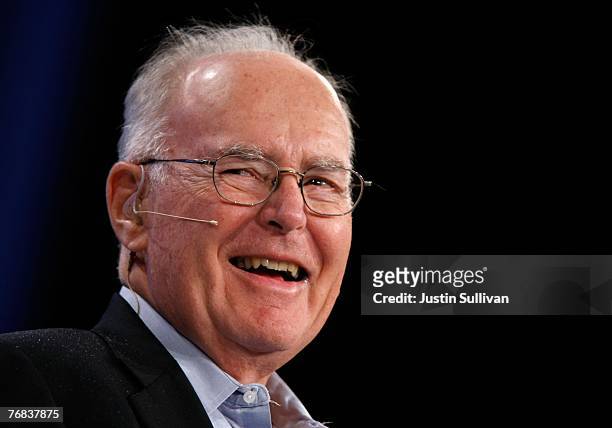 Intel co-founder Gordon Moore smiles as he speaks during a conversation with National Public Radio host Dr. Moira Gunn during the 2007 Intel...