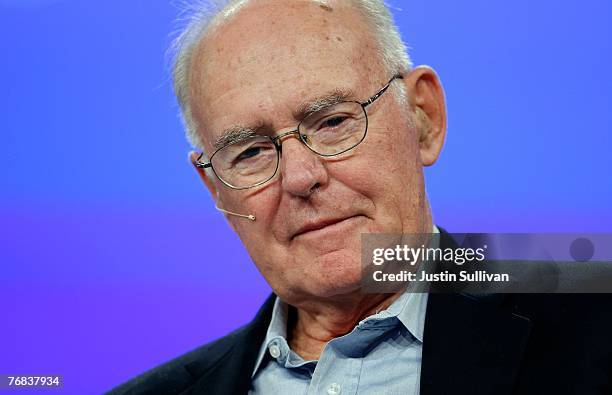 Intel co-founder Gordon Moore listens during a conversation with National Public Radio host Dr. Moira Gunn at the 2007 Intel Developer Forum...