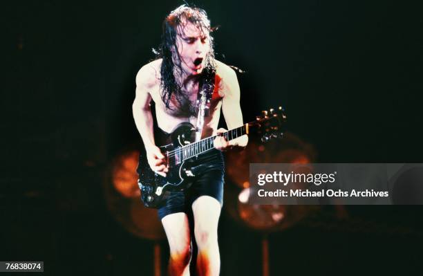 Guitarist Angus Young of AC/DC shreds a solo during a concert on October 18 at the Forum in Inglewood, California.
