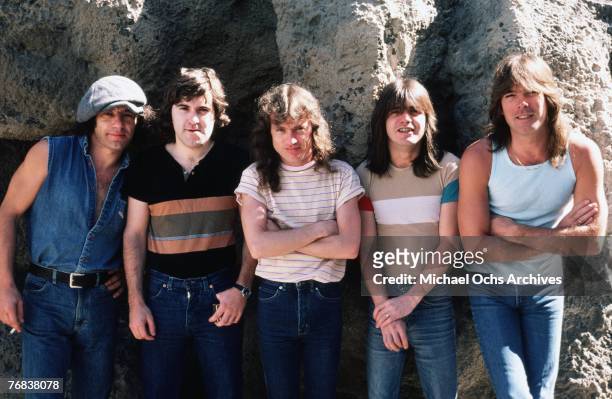 Singer Brian Johnson, drummer Simon Wright, lead guitarist Angus Young, rhythm guitarist Malcolm Young, and bassist Cliff Williams of AC/DC pose for...