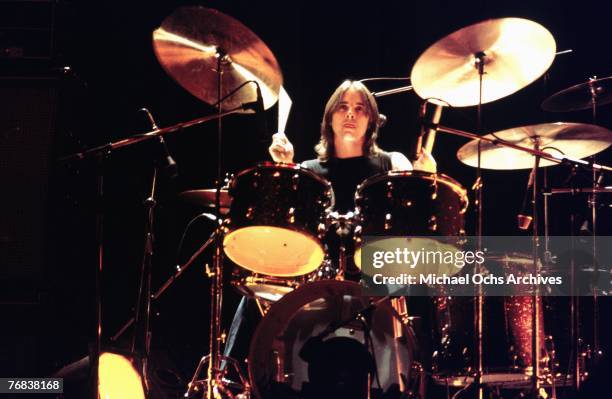 Drummer Phil Rudd of AC/DC performs a gig in February 1977 in Hollywood, California.