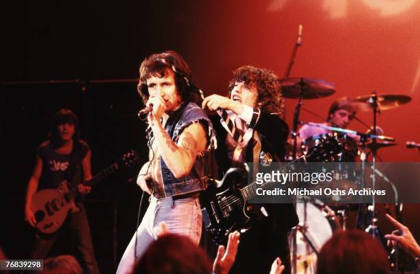 Singer Bon Scott and guitarist Angus Young of AC/DC put on a show for the crowd circa 1977 in Hollywood, California. In the background can be seen...