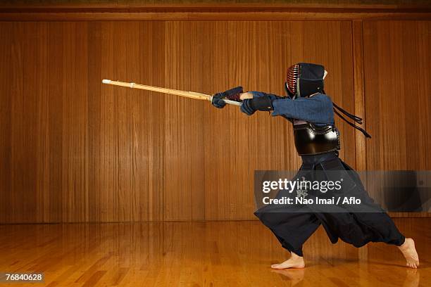 kendo fencer practicing - japanese martial arts stock pictures, royalty-free photos & images