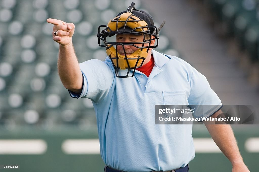 Umpire calling play