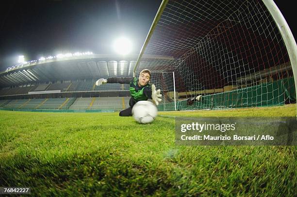 goalie missing a save - bad goalkeeper stock pictures, royalty-free photos & images