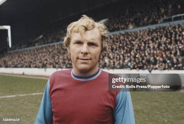 English professional footballer and defender with West Ham United Football Club, Bobby Moore pictured on the pitch at Upton Park in London prior to a...