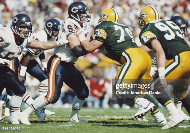 Jay Hilgenberg, Center for the Chicago Bears blocks Bob Nelson Nose Tackle for the Green Bay Packers during the National Football Conference Central...