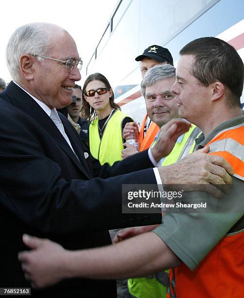 Australian Prime Minister John Howard tours a bus depot September 19, 2007 in Canberra, Australia. Howard today announced the Federal Government will...