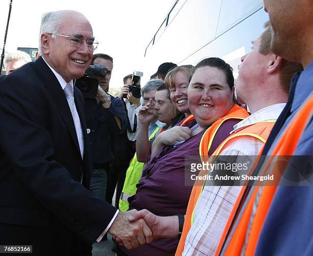 Australian Prime Minister John Howard tours a bus depot September 19, 2007 in Canberra, Australia. Howard today announced the Federal Government will...