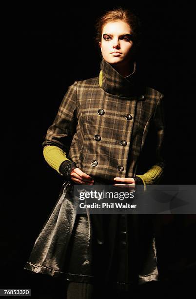 Model showcases designs on the catwalk by Ricochet on the third day of Air New Zealand Fashion Week 2007 at Viaduct Harbour Marine Village on...