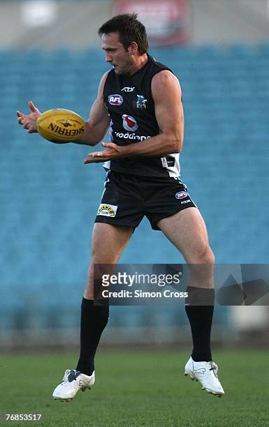 Darryl Wakelin of the Power marks the ball during a Port Adelaide Power AFL training session at AAMI Stadium on September 19, 2007 in Adelaide,...