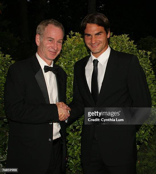 John McEnroe the 2007 Philippe Chatrier Award winner and Roger Federer, ITF Mens champion, at the International Tennis Federation, World Champions...