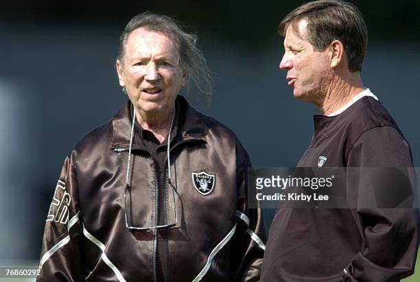 Oakland Raiders owner Al Davis and coach Norv Turner during mini camp on Wednesday, June 23, 2004.