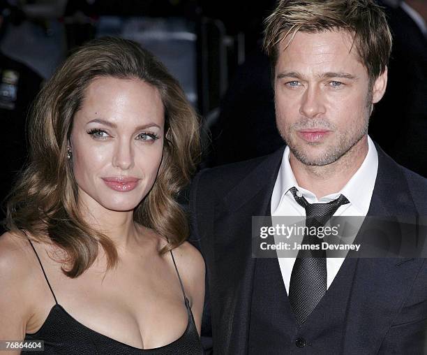 Angelina Jolie and Brad Pitt arrive at the premiere of "The Assassination of Jesse James by the Coward Robert Ford" at the Ziegfeld Theatre in New...