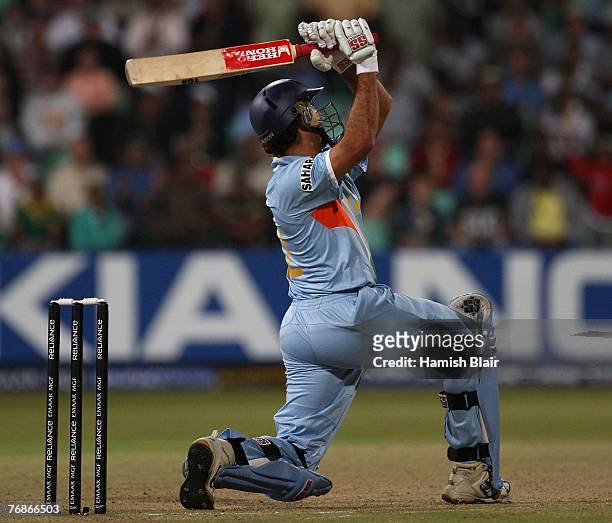 Yuvraj Singh of India hits his sixth six off one over from Stuart Broad of England to reach his half century in a record 12 balls during the ICC...