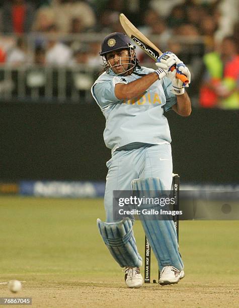 September: MS Dhoni of India hits the ball during the ICC Twenty20 Cricket World Championship Super Eights match between England and India at...