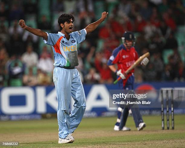 Singh of India celebrates the wicket of Owais Shah of England with Paul Collingwood of England looking on during the ICC Twenty20 Cricket World...