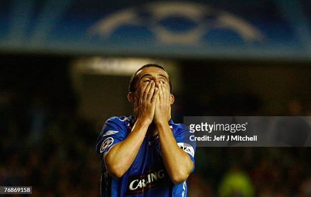 Barry Ferguson of Rangers reacts during the UEFA Champions League match between Rangers and VfB Stuttgart at Ibrox Park September 19, 2007 in...