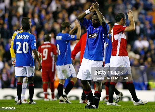 Jean-Claude Darcheville of Rangers salutes the crowd after the UEFA Champions League match between Rangers and VfB Stuttgart at Ibrox Park September...