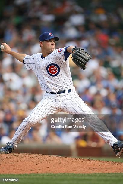 Michael Wuertz of the Chicago Cubs pitches during the game against the Los Angeles Dodgers at Wrigley Field in Chicago, Illinois on September 6,...