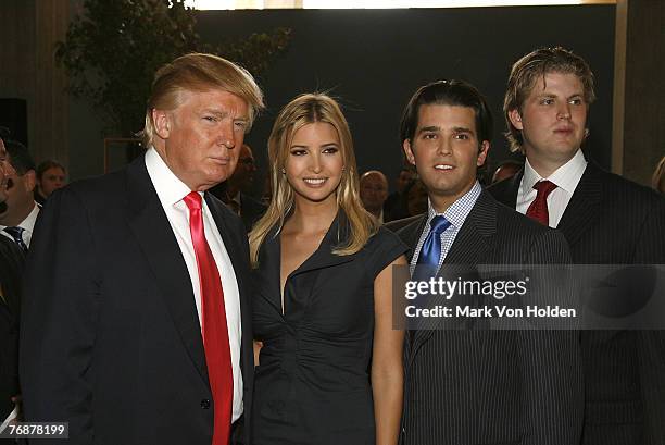 Donald Trump, Ivanka Trump, Donald Trump Jr., and Eric Trump pose at the Trump Soho Launch on September 19, 2007 in New York City.