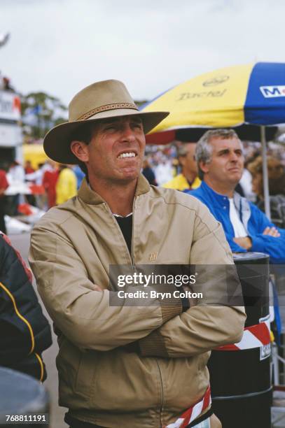 Captain Mark Phillips, the husband of Princess Anne, in the pit lane ahead of the 1986 Australian Grand Prix at the Adelaide Street Circuit in...